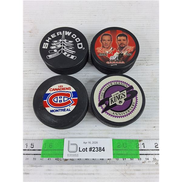 (4) Hockey Pucks - Montreal Canadiens, Sherwood, LA Kings, Team Canada