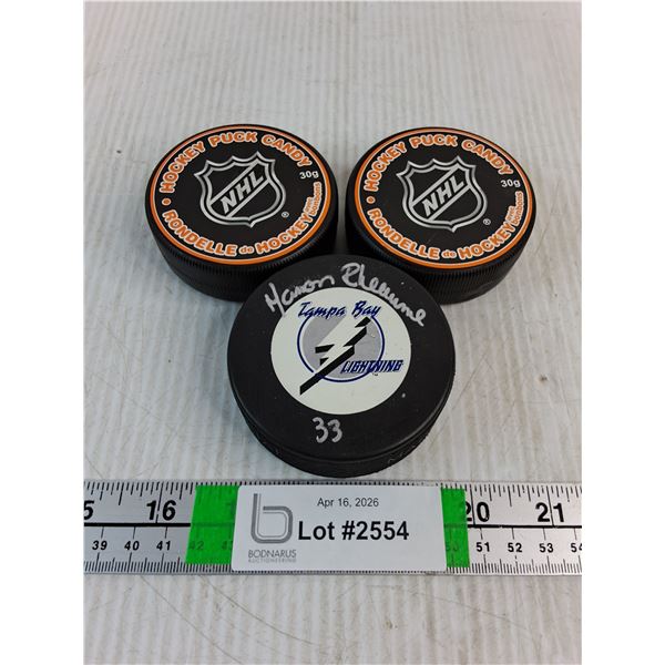 (2) NHL Puck Candy and Manon Rheaume Autographed Puck-cannot authenticate