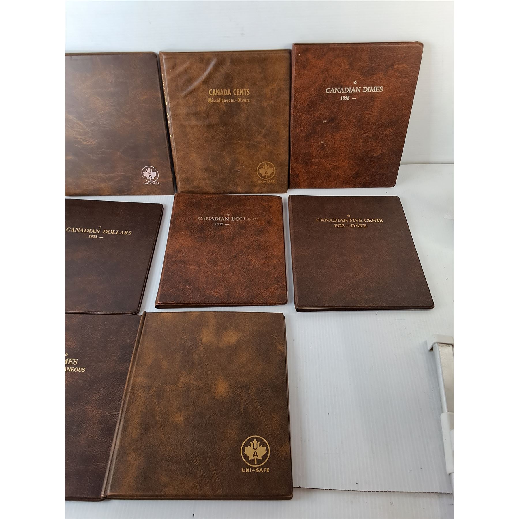 (10) Coin Display Books - Bodnarus Auctioneering