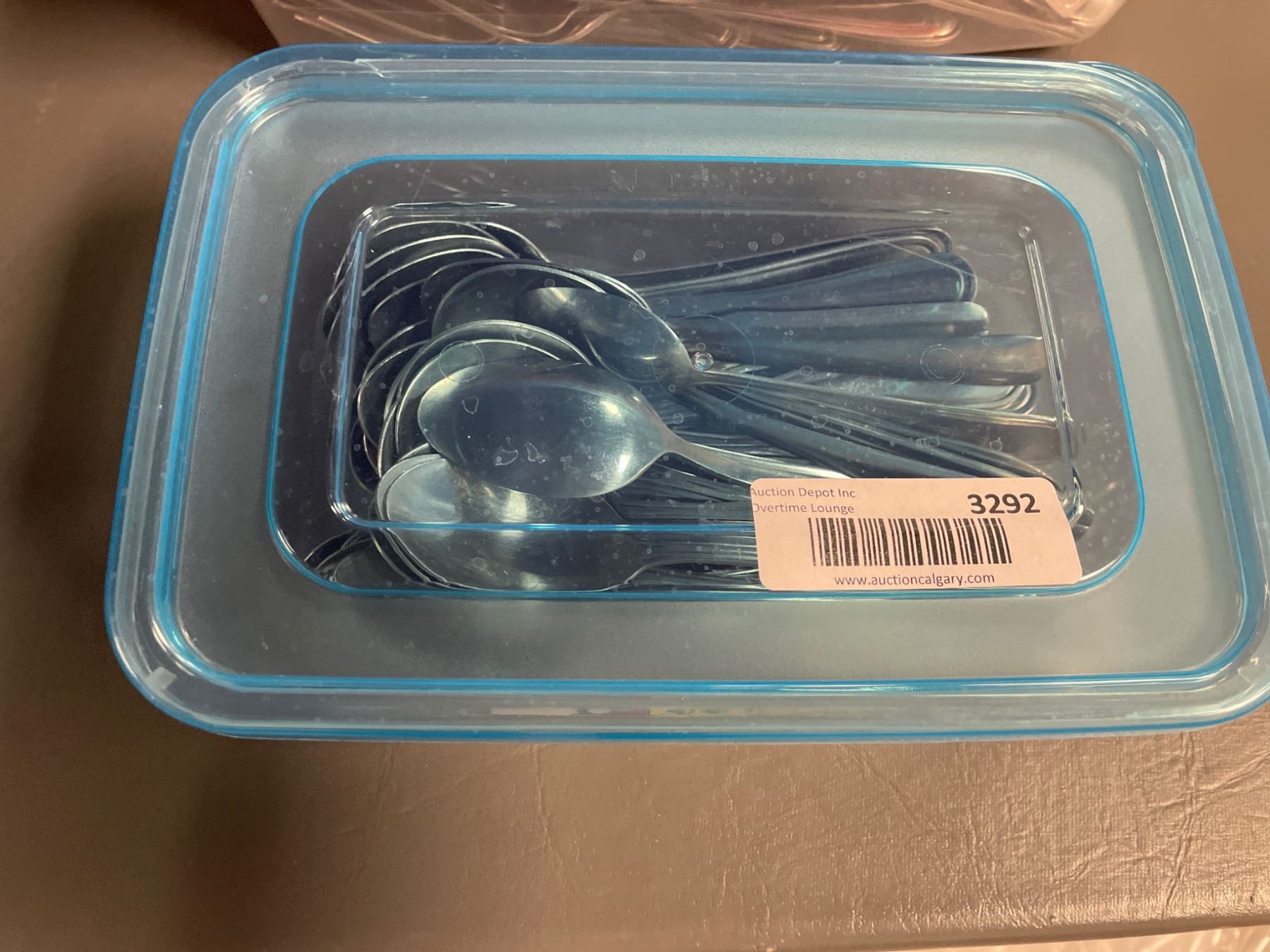 Lot of Spoons in a Plastic Container