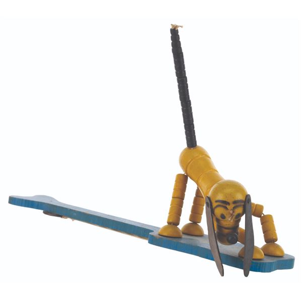 A 1930s Fisher-Price Pop-Up Kritter Pluto Toy.