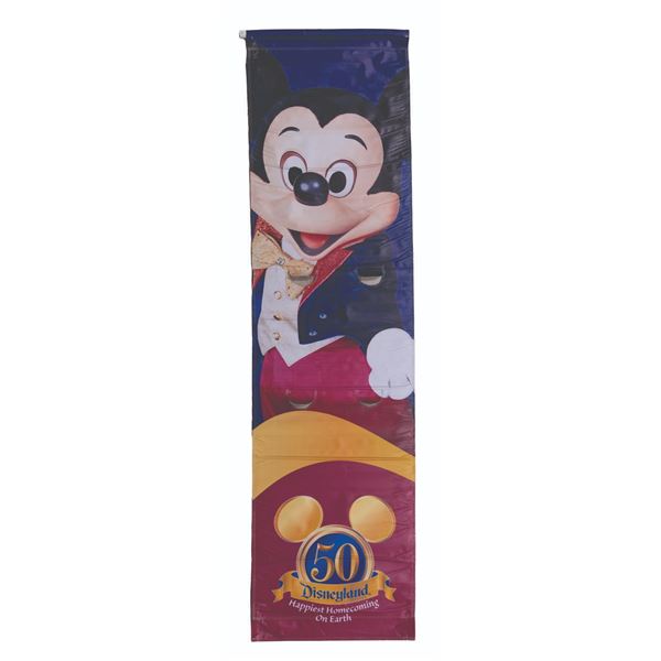 A Disneyland 50th Anniversary Mickey Mouse Banner.