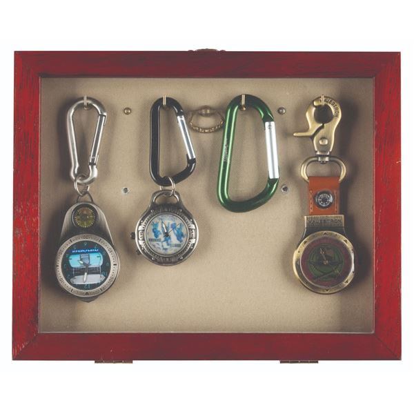 A Framed Collection of Attraction Watches and Carabiner.