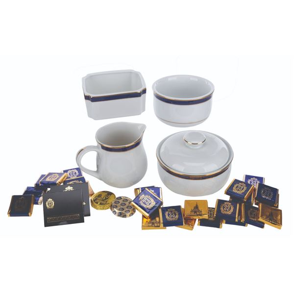 A Club 33 Tableware Set with Chocolates and Notepads.