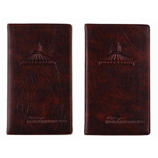 A Pair of Space Mountain Magic Kingdom Club Almanacs.