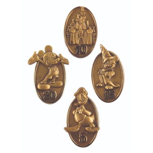 A Set of Cast Member Service Award Pins.