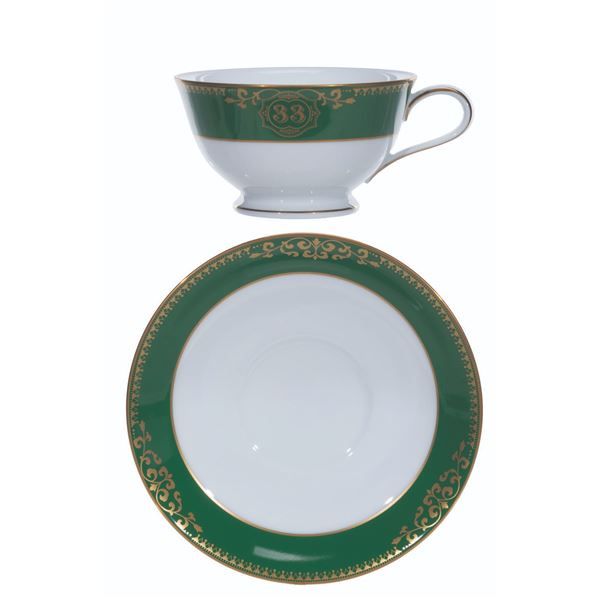 A Tokyo Disneyland Club 33 Cup and Saucer.