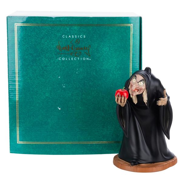 A WDCC "Take the Apple, Dearie" Figurine.