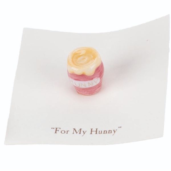 A Mini "Winnie the Pooh" Red Honey Pot Figurine.