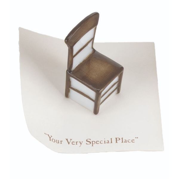 A Mini "Winnie the Pooh" Wooden Chair Figurine.