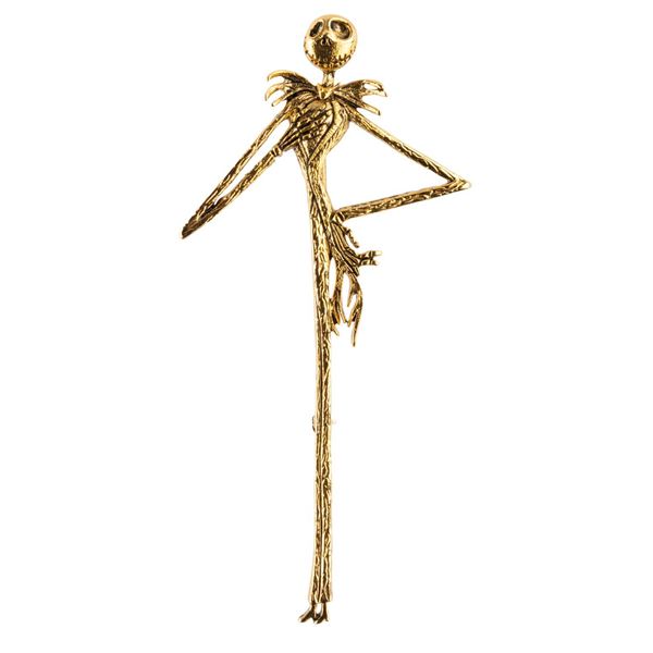 A Golden Jack Skellington Pin.