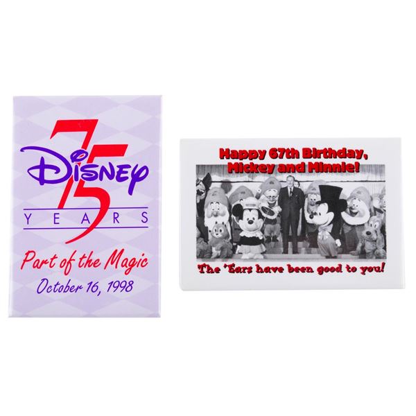 A Pair of Disney Anniversary Buttons.
