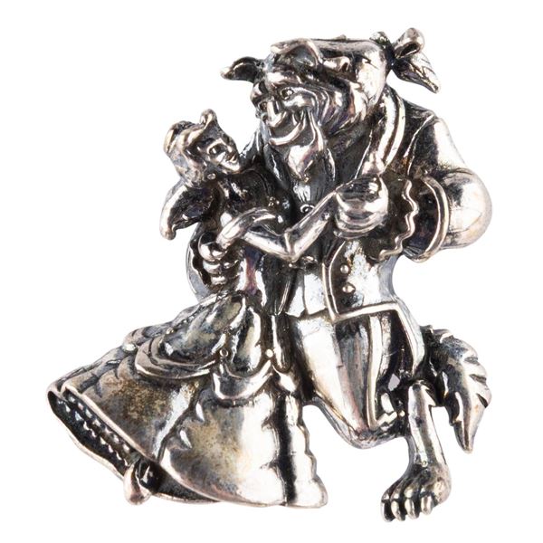 A Sterling Silver "Beauty and the Beast" Pin.