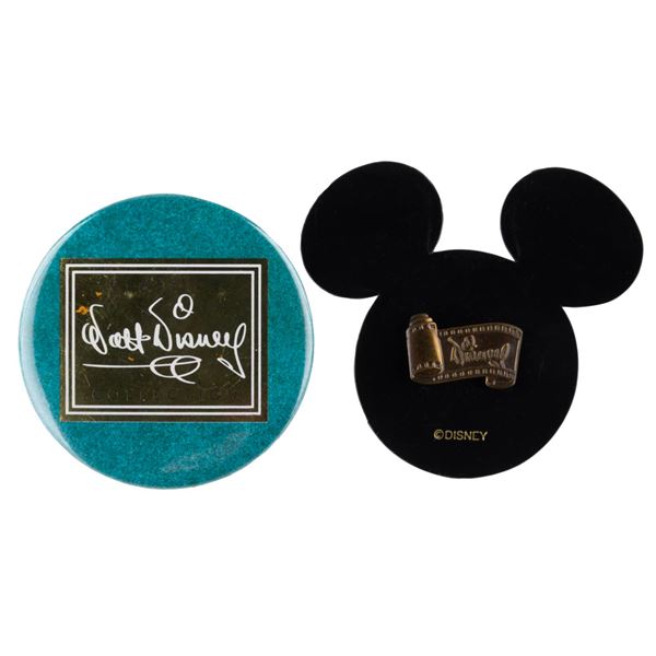 A Walt Disney Classics Collection Pin and Button.