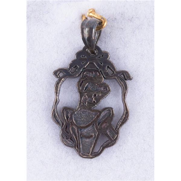 A Disneyland "Cinderella" 50th Anniversary Pendant.