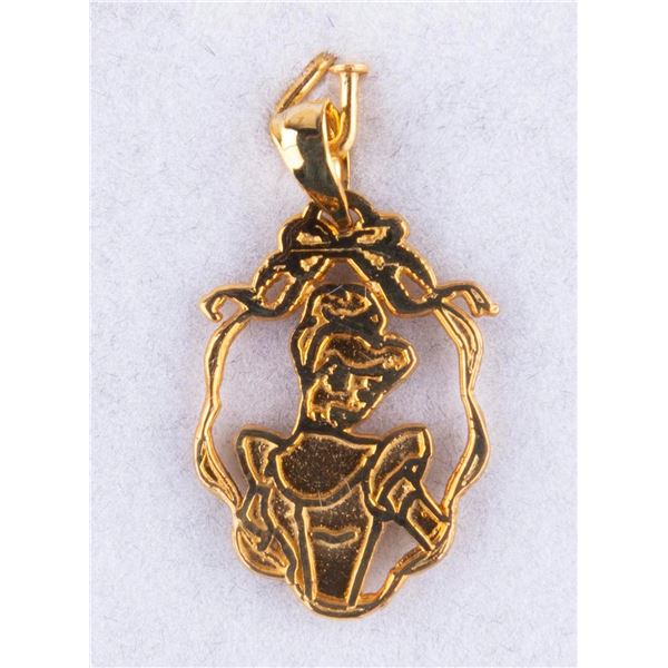 A Disneyland "Cinderella" 50th Anniversary Gold-Colored Pendant.