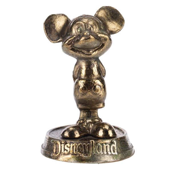 A Metal Mickey Mouse Paperweight.