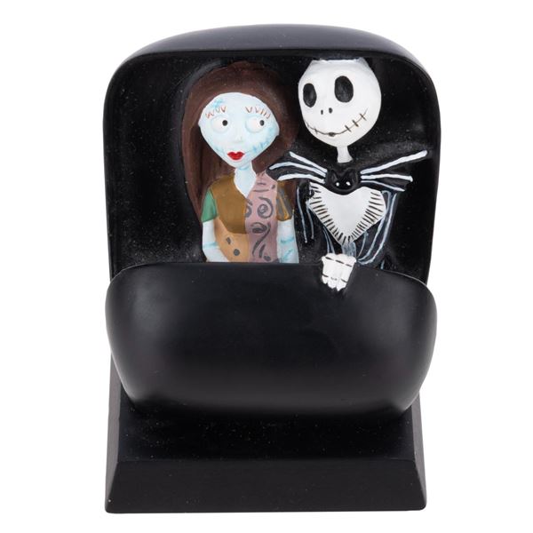 A Jack and Sally Haunted Mansion Figurine.