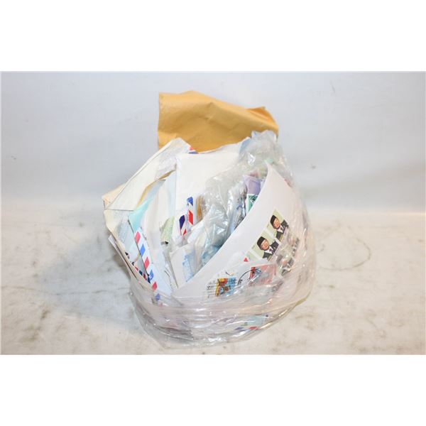 LARGE BAG FILLED WITH ENVELOPES OF STAMPS ALL