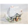 Image 1 : WHIMSICAL TEAPOT HOUSE FLORIST