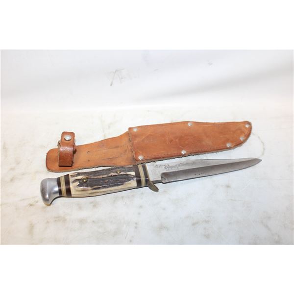 SOLINGEN BUCK KNIFE IN CARVED LEATHER SHEATH