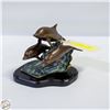 Image 1 : 3 BRASS DOLPHINS ON STAND - DESK DECOR
