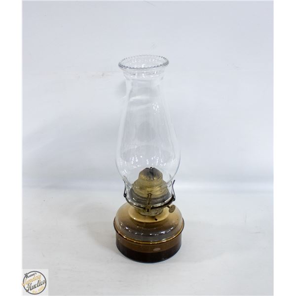 VINTAGE GLASS OIL LAMP PARTIALLY FULL WITH