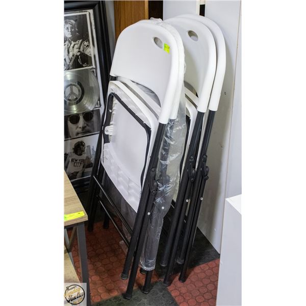 4 WHITE FOLDING CHAIRS