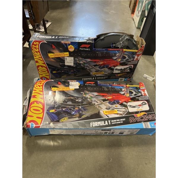 TWO HOT WHEELS FORMULA 1 RACING SETS ONLY MISSING ONE EXTRA CAR 5 OF 6 ARE ACCOUNTED FOR