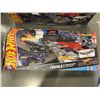 Image 2 : TWO HOT WHEELS FORMULA 1 RACING SETS ONLY MISSING ONE EXTRA CAR 5 OF 6 ARE ACCOUNTED FOR