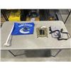Image 1 : SMALL VINTAGE BRASS MIRROR AND CANUCKS FLAG AND HOLLAND AMERICA LINE WATERPROOF PHONE BAG