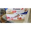Image 3 : 2 CASES OF PROTEIN SHAKES - STRAWBERRY AND VANILLA, MISSING SOME BOTTLES