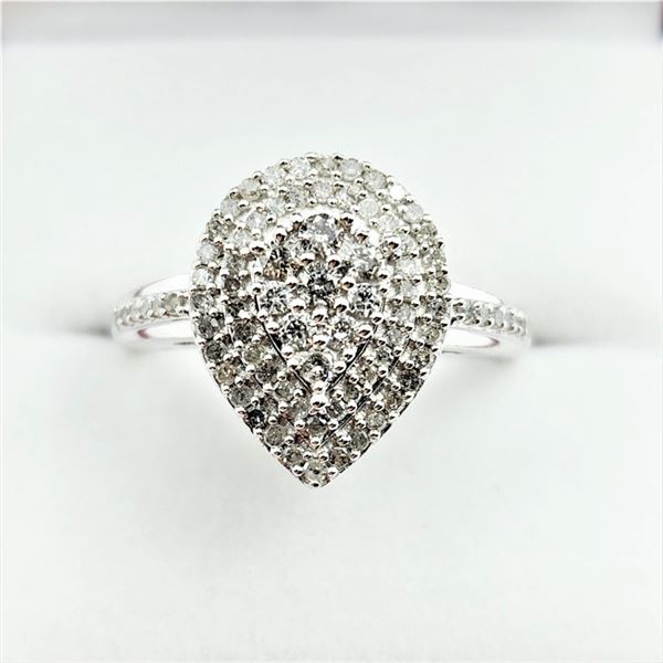 STERLING SILVER NATURAL DIAMOND (0.50CT) PEAR SHAPE RING, SIZE 7, W/A $1785.00. DIAMOND IS THE BIRTH