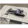 Image 1 : DYSON V7 WITH CHARGER. WORKING. DOES NOT HAVE A STICK