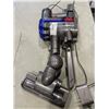 Image 4 : DYSON V7 WITH CHARGER. WORKING. DOES NOT HAVE A STICK
