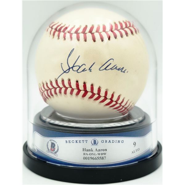 HANK AARON SIGNED AND ENCASED BASEBALL - BECKETT COA