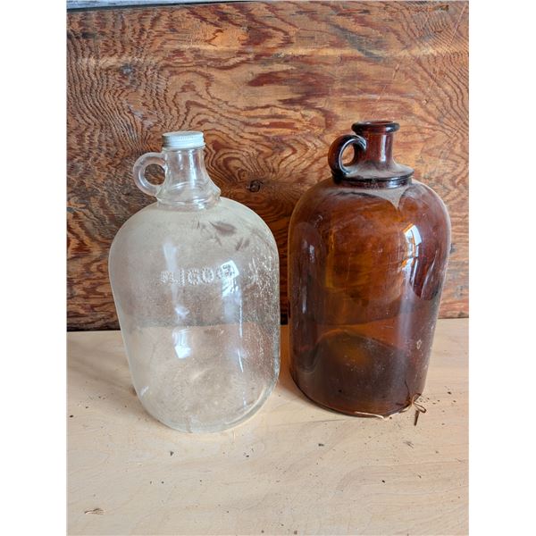 (2) Vintage Glass Jugs (1) Made in Canada Both Marked "D"