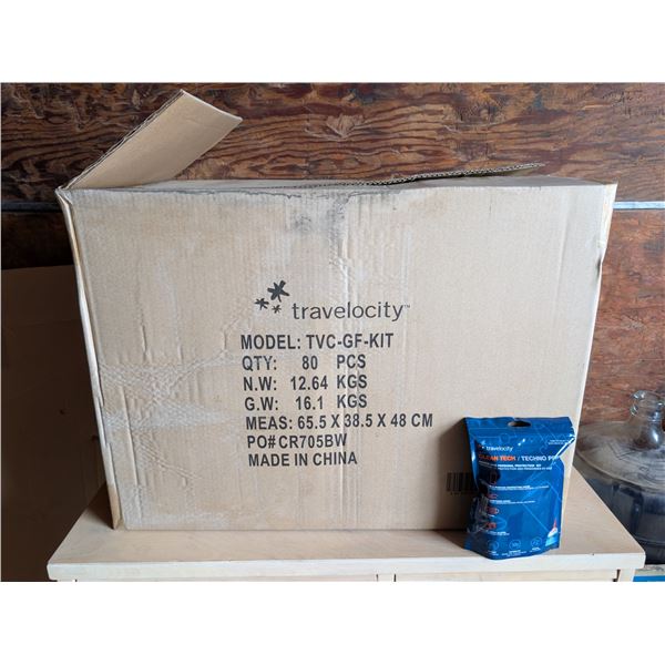 Giant Box of Travelocity Clean Tech Packages