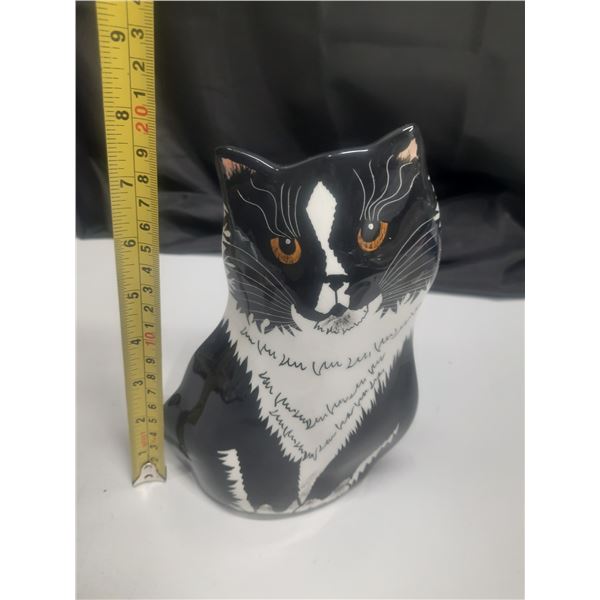 This is a ceramic tuxedo cat vase or figurine from the "Cats by Nina" collection, designed by artist