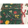 Image 4 : Decorative Christmas tablecloth featuring holiday patterns like ornaments, holly, and ribbon. (Made 