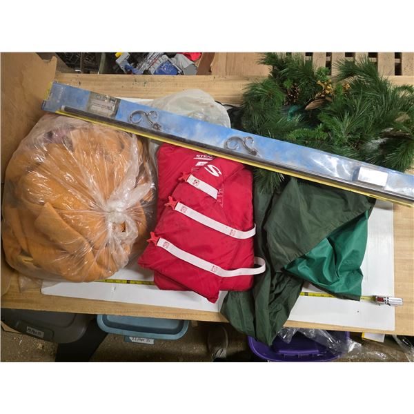 Lot of misc items, blanket, décor, life jacket