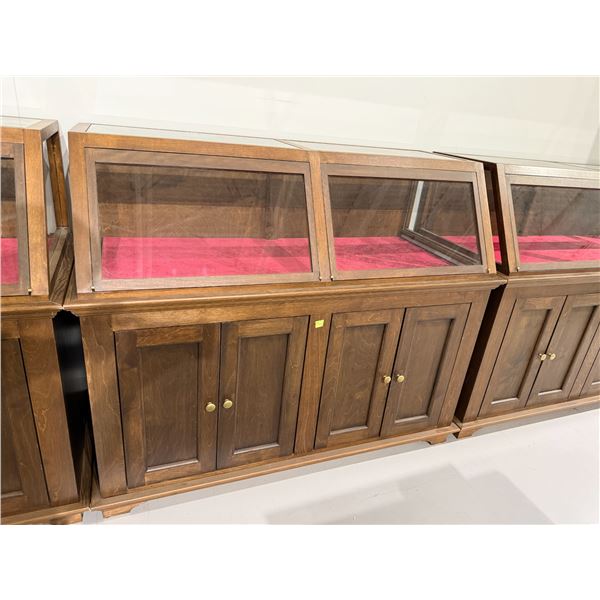 Floor Standing Showcase with Slant Front & 4 Door Storage in the Base (25" D x 57' W x 47" H)