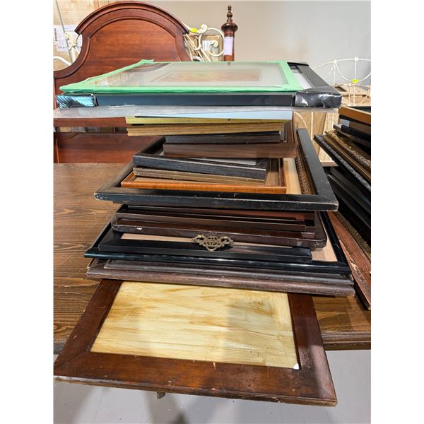 Stack of Assorted Picture Frames * Wide range of sizes, materials, and eras * Majority are empty