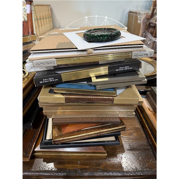 Stack of Assorted Picture Frames * Wide range of sizes, materials, and eras * Majority are empty