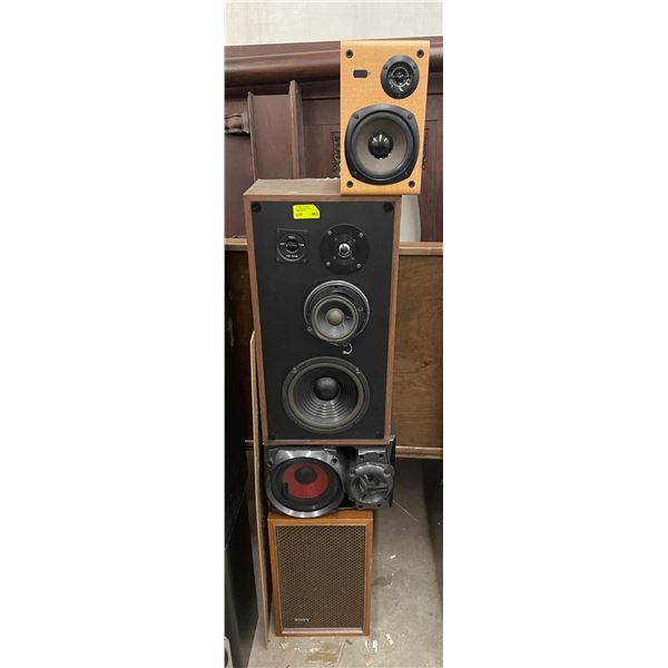 Tower of Assorted Speakers Bolted Together