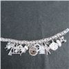 Image 1 : Vintage Sterling silver charm bracelet with 16 charms.  Beautiful!