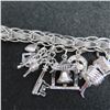 Image 3 : Vintage Sterling silver charm bracelet with 16 charms.  Beautiful!