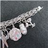 Image 5 : Vintage Sterling silver charm bracelet with 16 charms.  Beautiful!