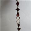 Image 5 : 925 bracelet with deep red/amber coloured stones.  Really nice - seems well made.  Marked 925