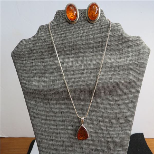 925 & Amber jewellery lot.  Includes pendant on chain and pair of clip on earrings